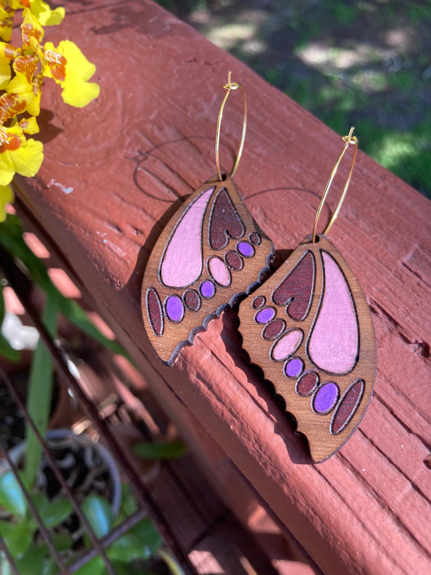 Butterfly wing earrings in Purple